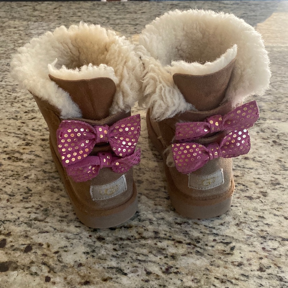 Size 2 UGG boot.  In good condition.